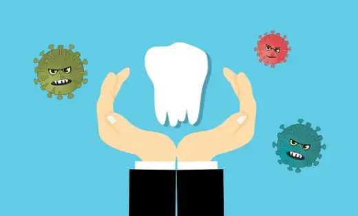 A creative illustration showing hands protecting a white tooth from colorful bacteria and germs.